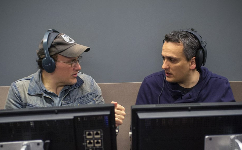 Joe and Anthony Russo sit at computers