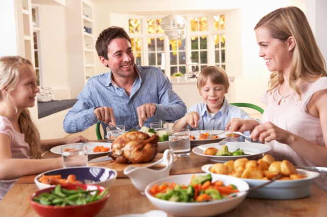 A family eating dinner A family eating dinner
