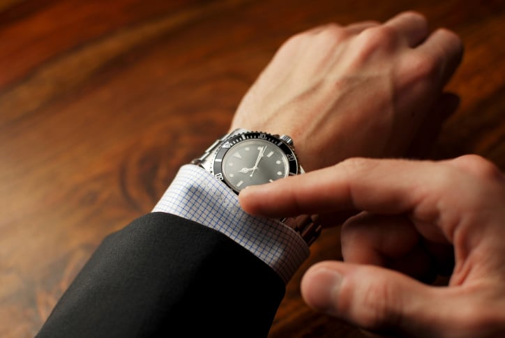 Man looking at his watch