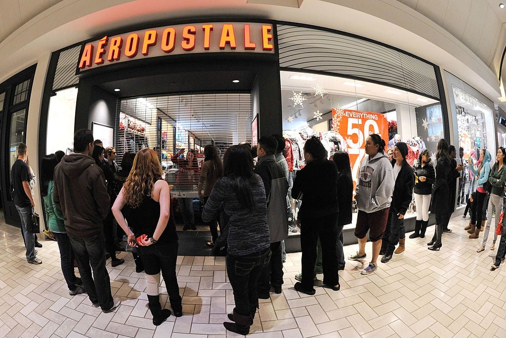 Shoppers wait for an Aeropostale store to open on November 26, 2010, at the Tyson's Corner Center mall in Tyson's Corner, Virginia