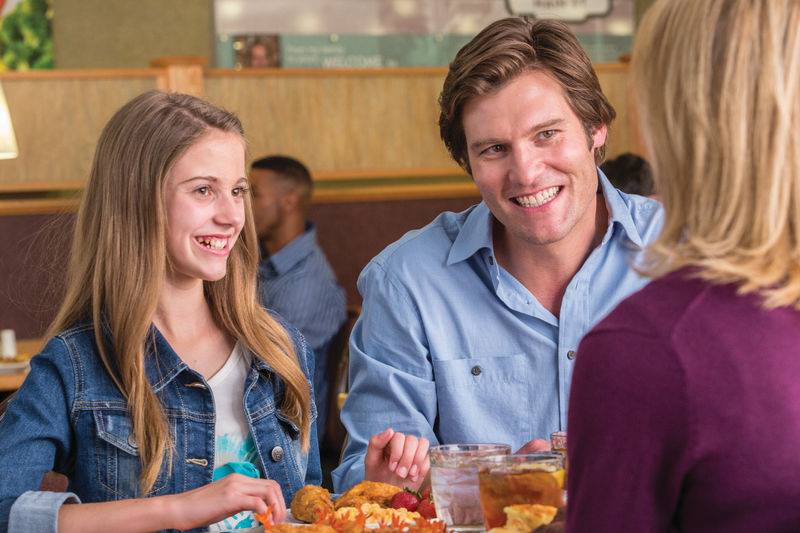Family eats together at an Old Country Buffet
