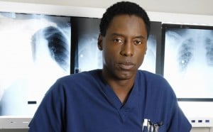 Isaiah Washington wearing a blue uniform in 'Grey's Anatomy'. Isaiah Washington wearing a blue uniform in 'Grey's Anatomy'.