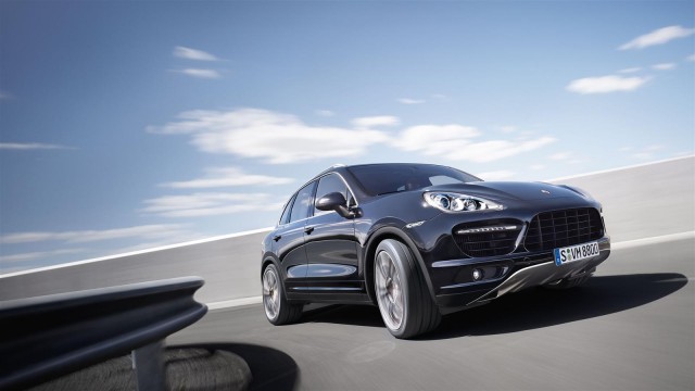 Black luxury vehicle on the road