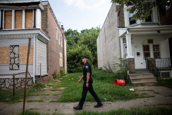 A crime ridden city with rundown buildings