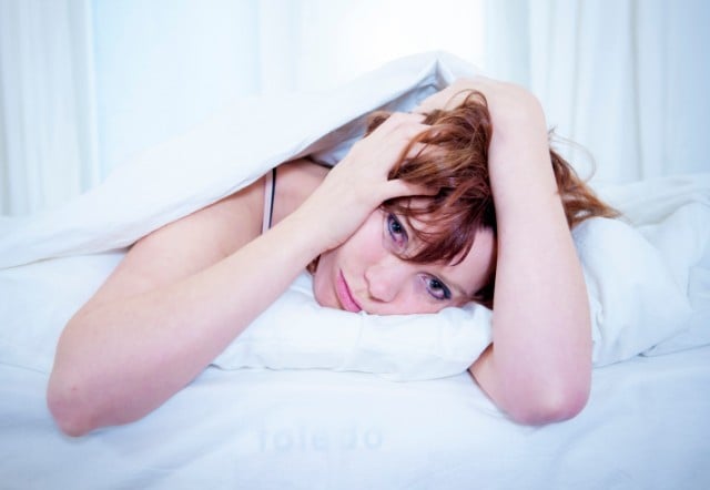 woman who is trying to sleep