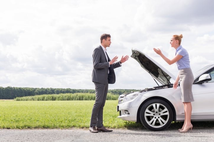 Couple fighting about car problems