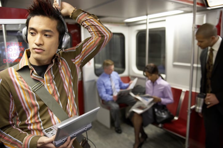 Guy listening to music, going to work