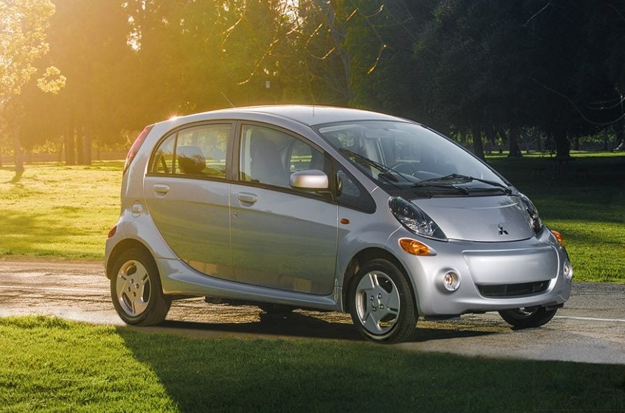 Profile shot of Mitsubishi mini electric car on the road