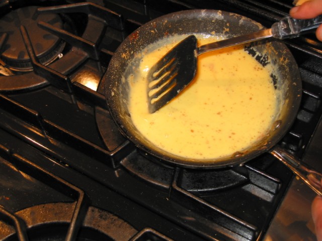 Making an omelet on the stove
