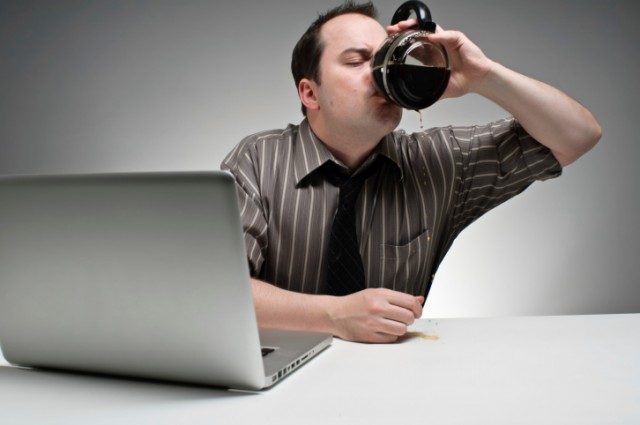 Man drinking coffee from the pot