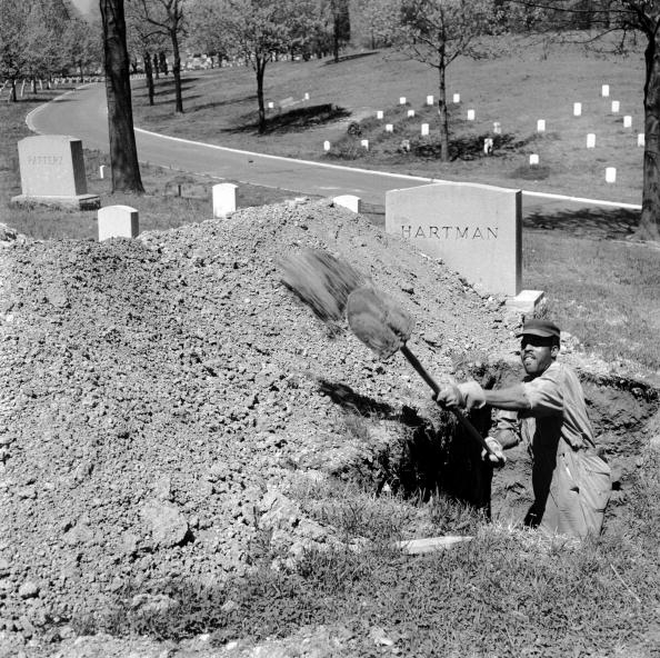 A man digging a grave
