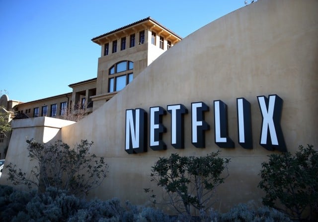 A sign is posted in front of the Netflix headquarters on January 22, 2014 in Los Gatos, California.