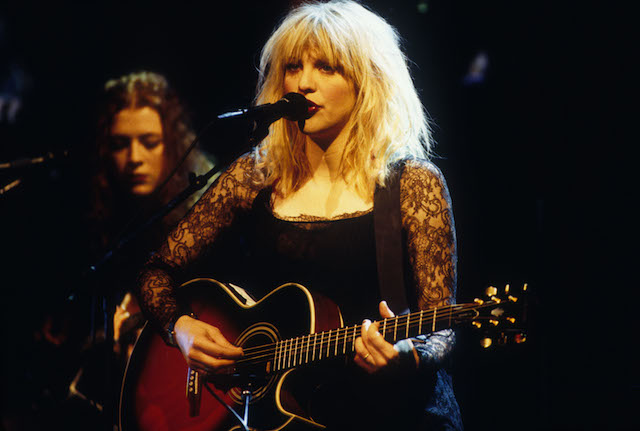 Courtney Love of Hole performs onstage.