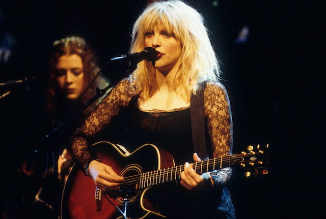 Courtney Love of Hole performs onstage.