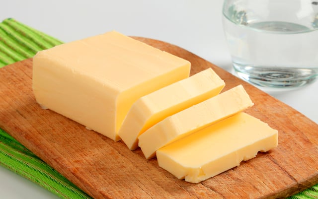 Big block of butter before being compounded with herbs