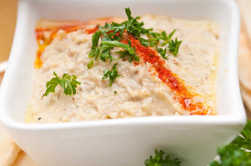 White bean dip in a square shaped bowl