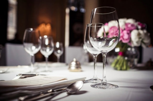 Wine glasses set at the restaurant table