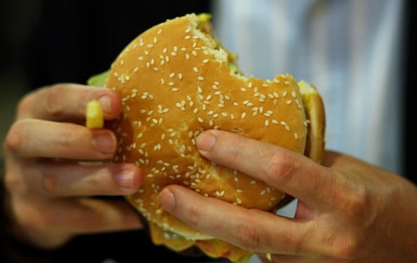 man eating a burger