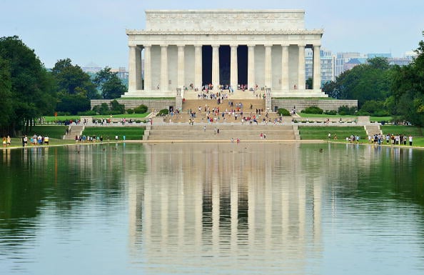 Tourists at the Lincoln Memorial on August 3, 2010 in Washington, DC. | Photo by Karen Bleier/AFP/Getty Images