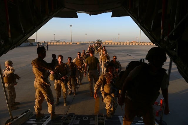 an air craft carrier with troops an air craft carrier with troops