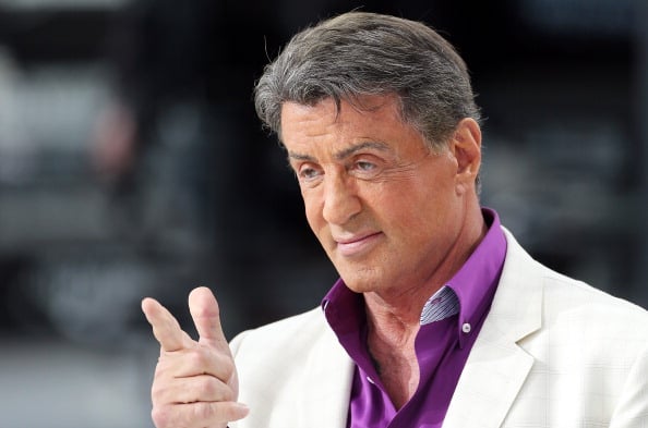 Sylvester Stallone strikes a pose the 67th edition of the Cannes Film Festival.
