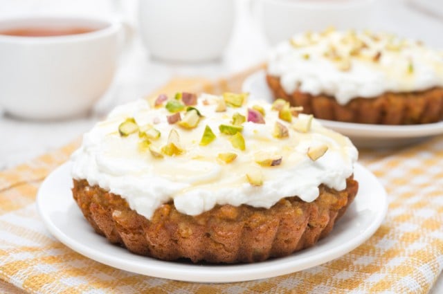 mini carrot cakes with cream of mascarpone and honey close-up