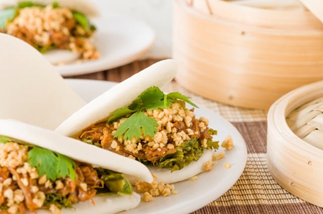 braised pork belly with pickled mustard greens, coriander and crushed peanuts in steamed buns