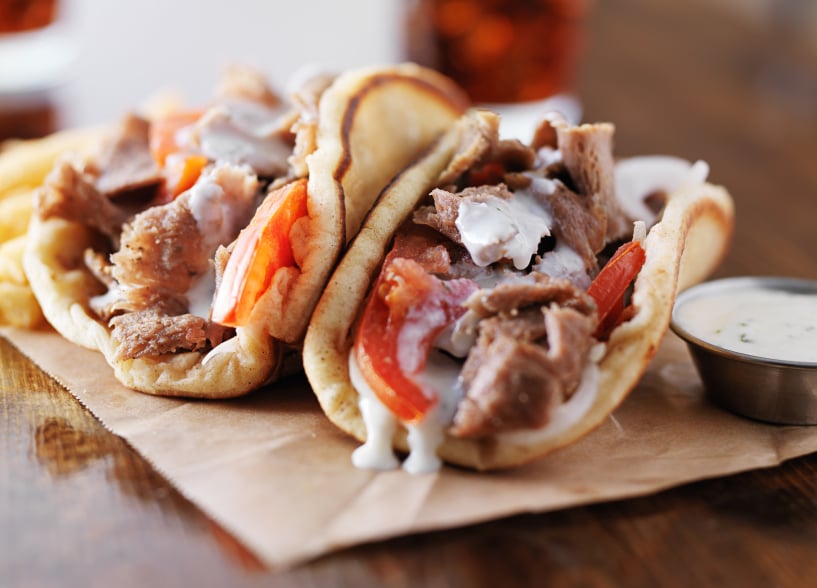 greek gyros with tzatziki sauce and fries