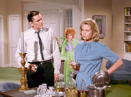 Darrin and Samantha and Endora stand in their living room having a drink. 