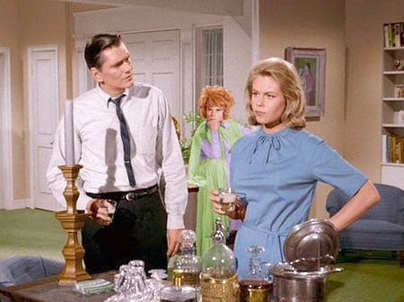 Darrin and Samantha and Endora stand in their living room having a drink. Darrin and Samantha and Endora stand in their living room having a drink.