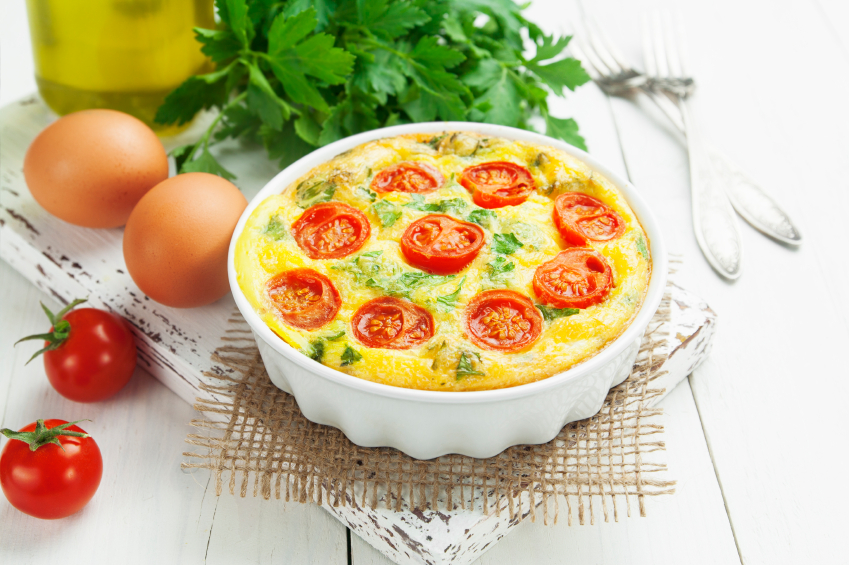 Omelet with vegetables and cheese. Frittata