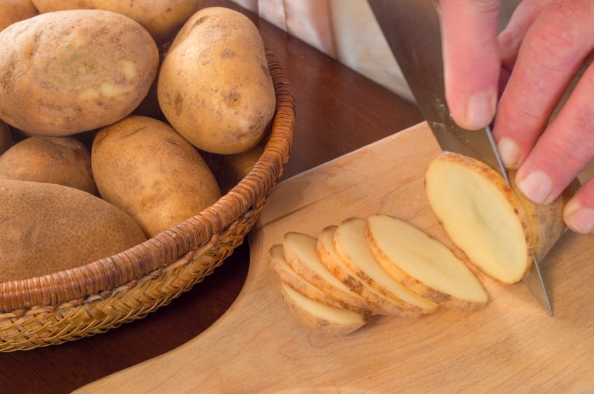 Slicing potatoes, cooking