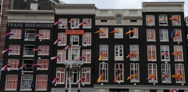 AMSTERDAM, NETHERLANDS - JULY 08: Flags and banners are hung up in windows and on flag poles as Amsterdam prepares for the forthcoming FIFA2010 World Cup Final between Netherlands and Spain, on July 8, 2010 in Amsterdam, Netherlands. (Photo by Christopher Lee/Getty Images)