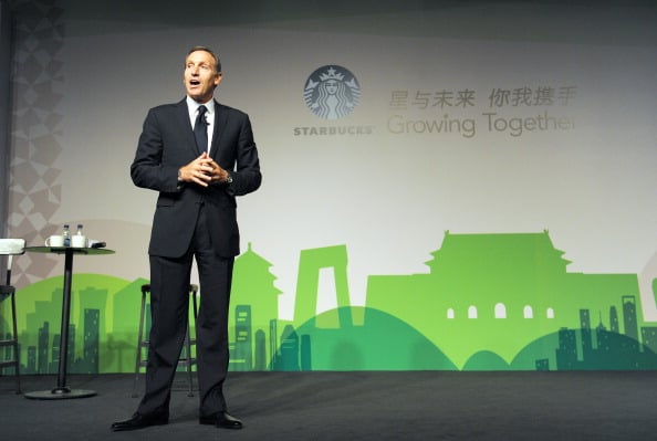 Howard Schultz, president and chief executive officer of Starbucks delivers his speech at the Starbucks Partner Family Forum in Beijing on April 18, 2012. (Photo by Liu Jin/AFP/Getty Images)
