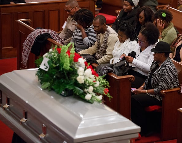 People attending a funeral