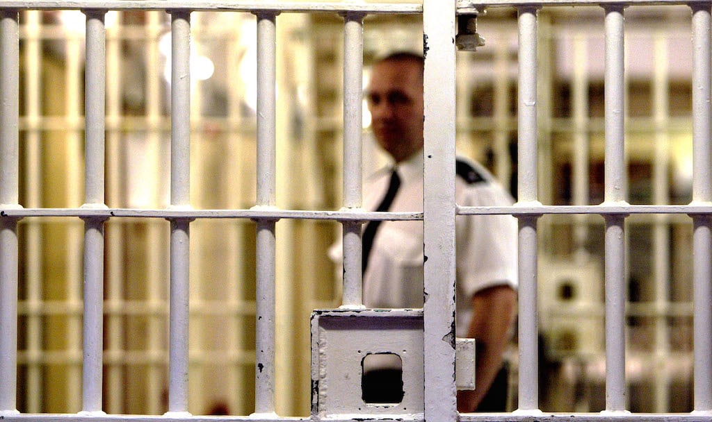 Prison guard and bars