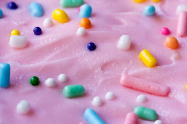 Pink frosting with sprinkles, icing
