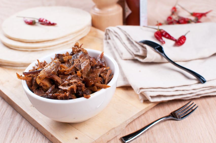 Mexican pulled pork with spices and tortillas