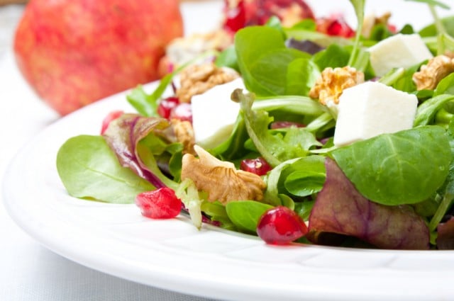 Salad, pomegranate, cheese, nuts
