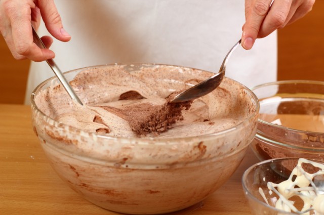 Mixing cocoa, sugar, chocolate, baking