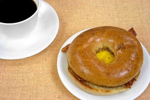 Breakfast bagel sandwich, coffee