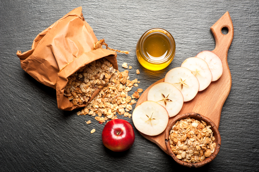 Granola, honey and fresh apples. Fitness breakfast.