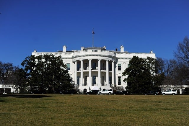The White House seen on a clear blue sky. The White House seen on a clear blue sky.