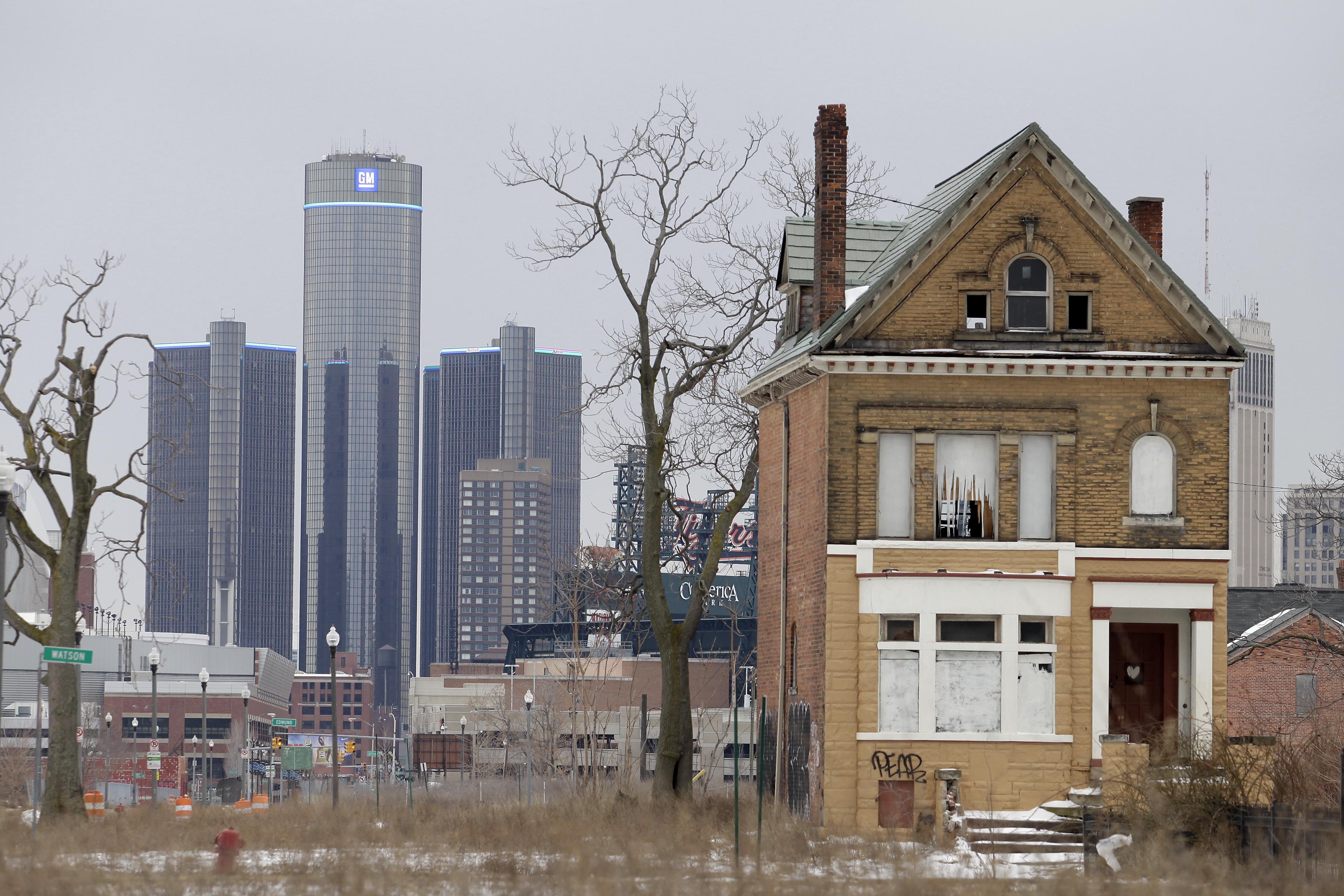 The General Motors (GM) world headquarters is seen February 24, 2013 in Detroit, Michigan. The city of Detroit has faced serious economic challenges in the past decade, with a shrinking population and tax base while trying to maintain essential services. A financial review team issued a finding on February 19 identifying the city as being under a 'financial emergency.' Michigan Gov. Rick Snyder has 30 days from the report's issuance to officially declare a financial emergency, which could result in the governor appointing an emergency financial manager to oversee Detroit's municipal government. (Photo by J.D. Pooley/Getty Images)