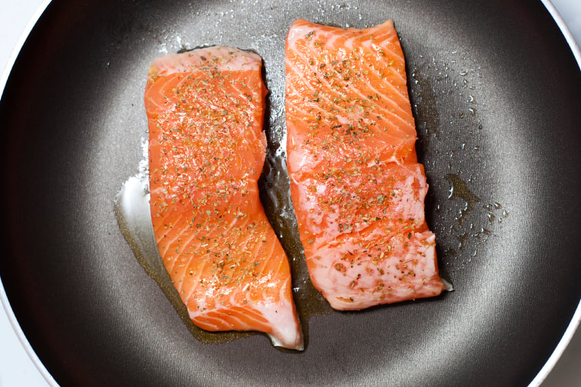 seared salmon in pan 