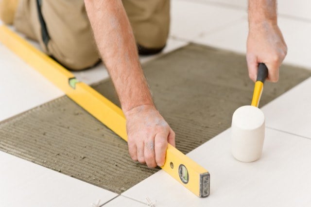 Measuring tile, tiling