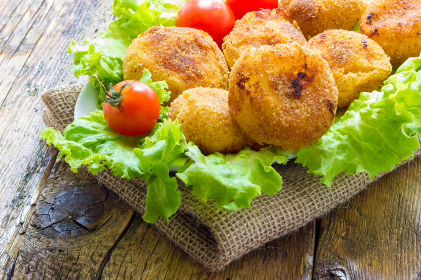 chicken croquettes on a bed of lettuce
