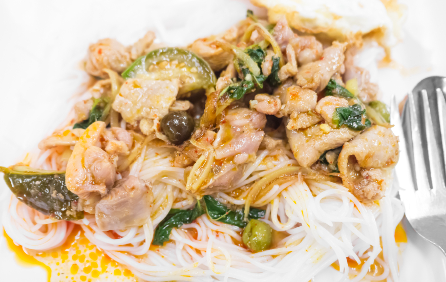 Thai spicy chicken stir-fried fusion with vermicelli noodle