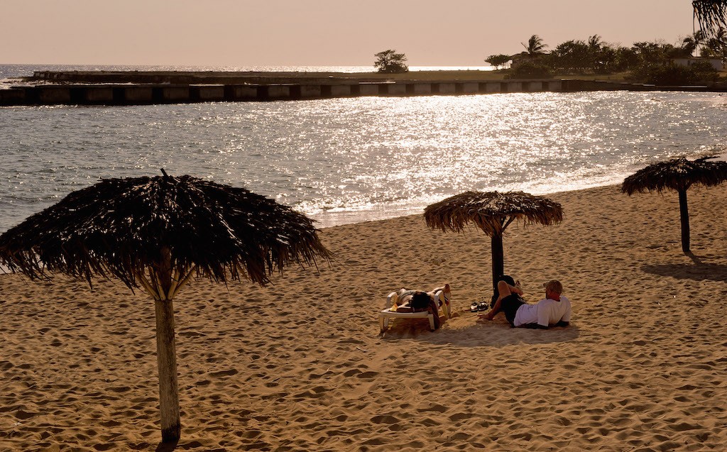 Cubans sunbath at Playa Giron beach, in the Bay of Pigs, Matanzas province, Cuba, on April 17, 2011. Playa Giron was one of the beaches where the invaders disembarked on April 1961. (Photo by Adalberto Roque/AFP/Getty Images)