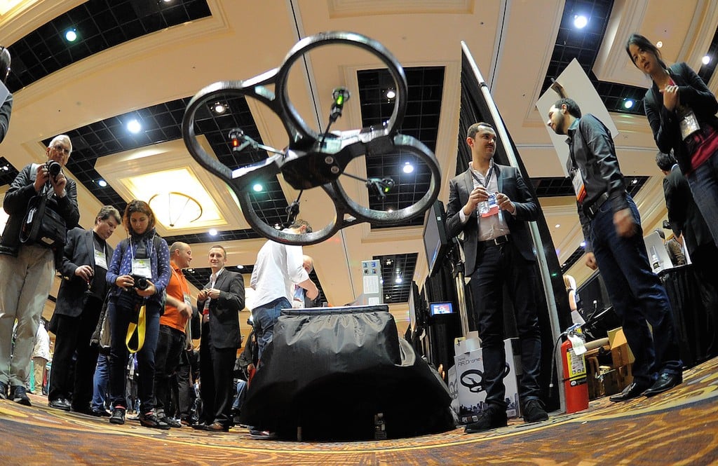 French Parrot introduces their automatic 4 rottor flying drones during the opening event ''CES Unveiled'' during the International Consumer Electronics Show (CES) in Mandalay Bay Hotel resort on January 06, 2013 in Las Vegas, Nevada. (Photo by Joe Klamar/AFP/Getty Images)